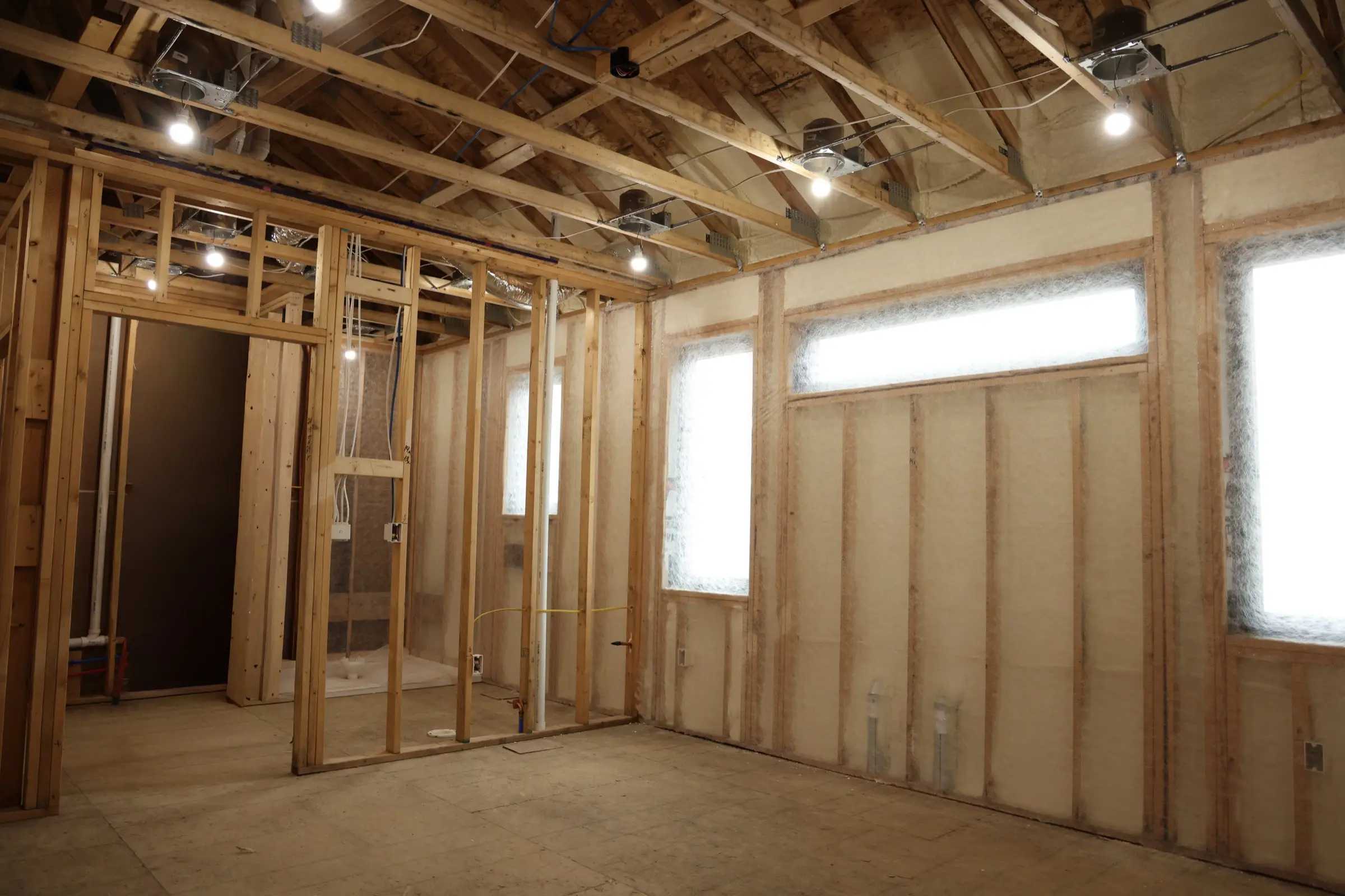 Finished roof deck metal building insulation coverage